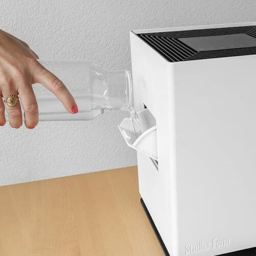 Uzupełnianie wody z boku podczas pracy