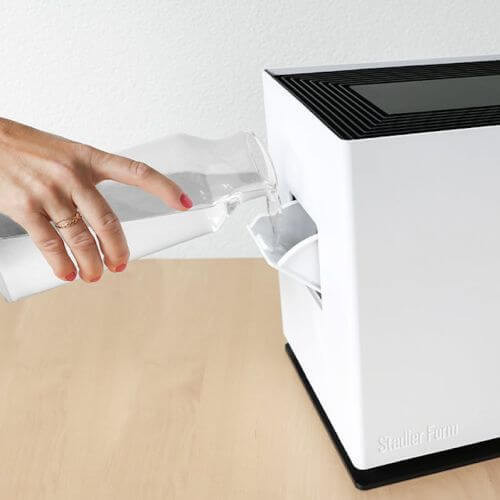 Uzupełnianie wody z boku podczas pracy