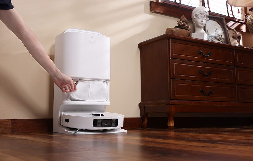 Automatycznie opróżnia zbiornik na kurz